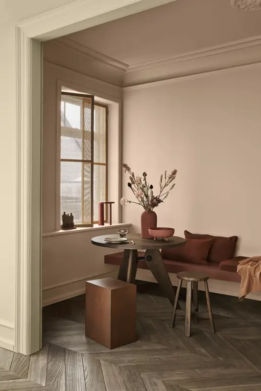 Living room painted with Jotun interior paint Desert Pink, Welcoming red and Hummus