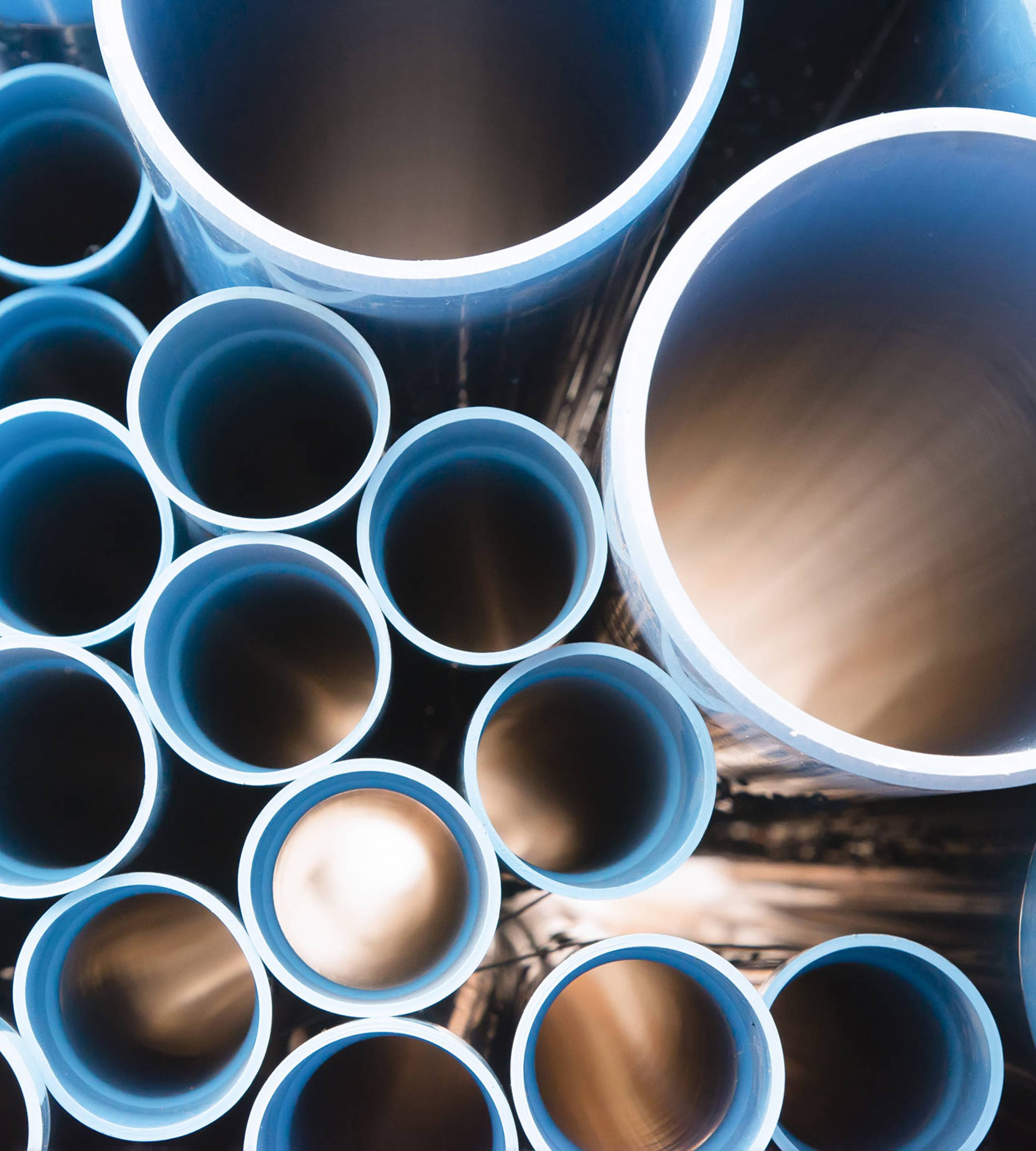 Water pipes stacked in a pile